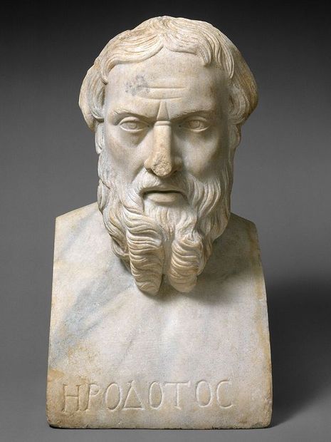 A marble portrait bust of the Greek historian Herodotus, bearded, with a calm expression.