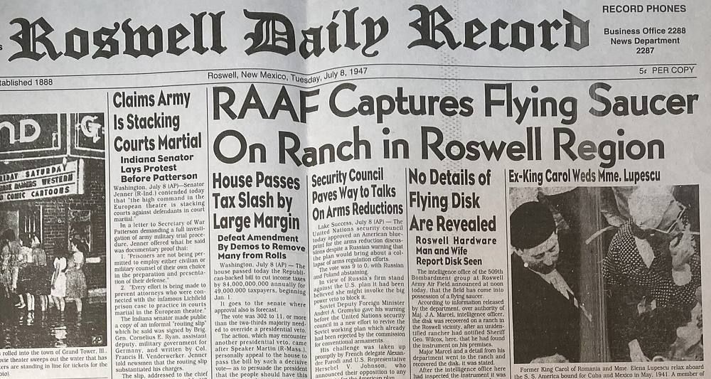 Upper part of a 1947 newspaper front page under the Roswell Daily Record masthead with the flying saucer headline.